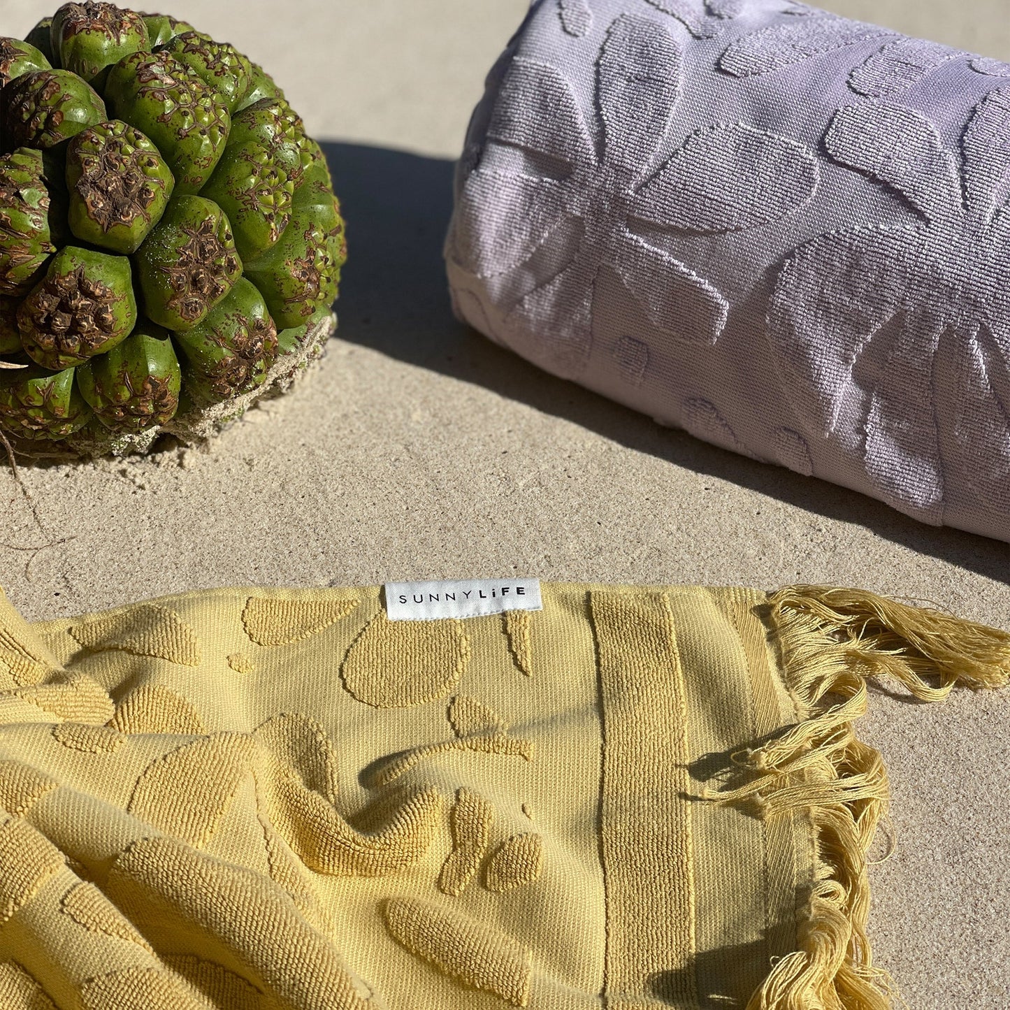 SUNNYLIFE : Inflatable Beach Pillow - Rio Sun Pastel Lilac